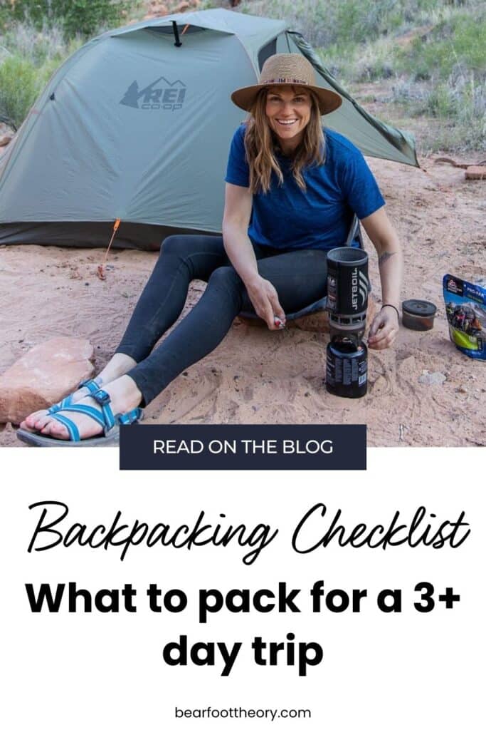 Pinterest image of woman sitting outside tent boiling water in camp stove. Text says “Backpacking Checklist: what to pack for a 3+ day trip"