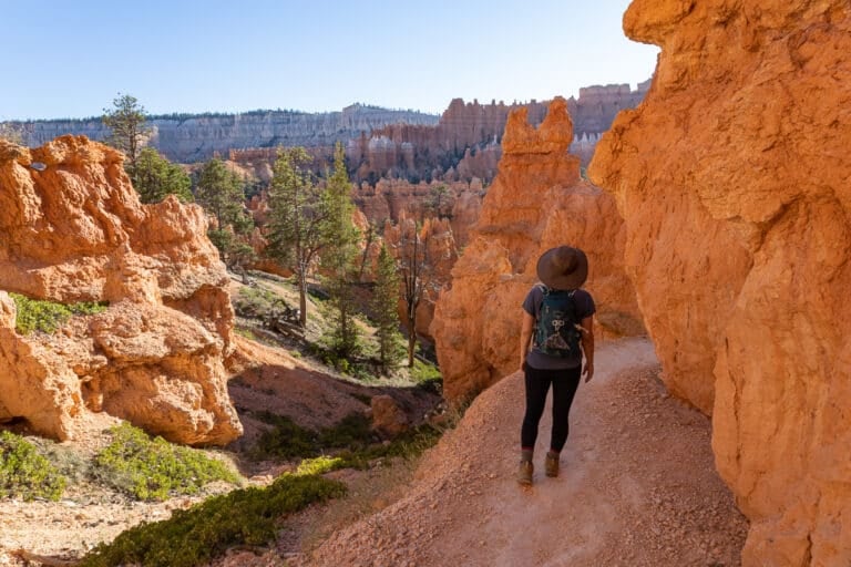 Woman hiking on the Queens Garden Navajo Loop Trail in Bryce Canyon National Park