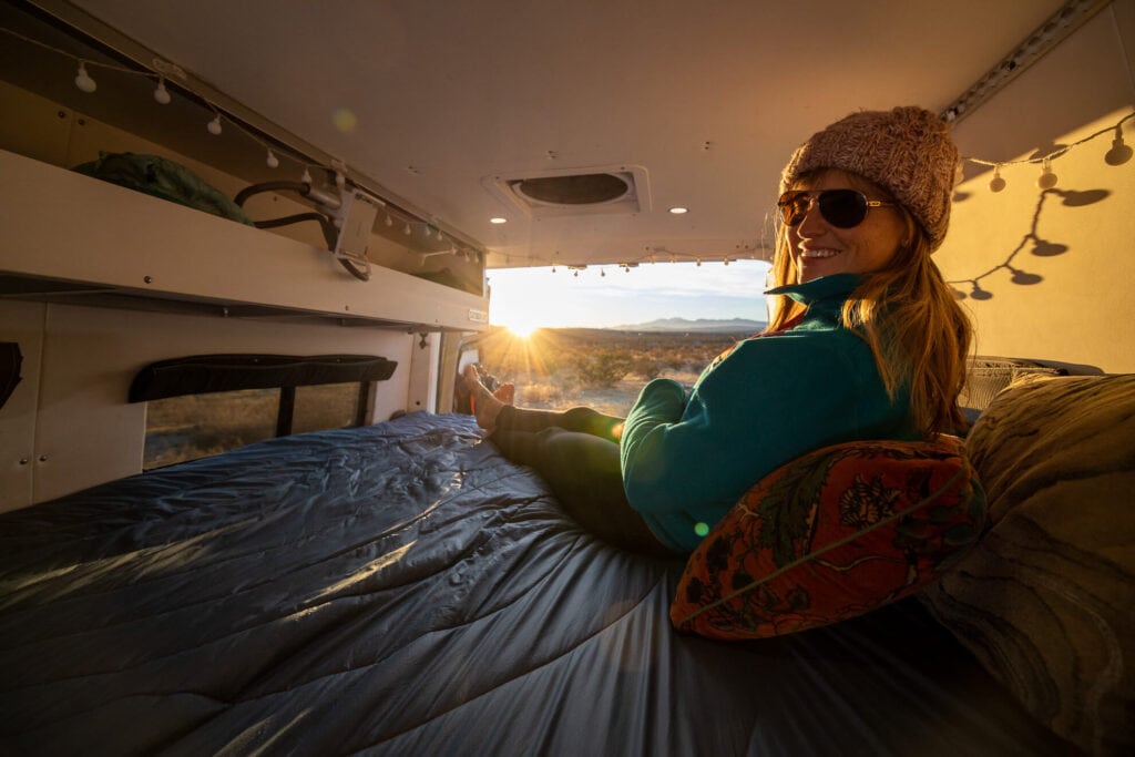 Curious about van life? Learn how to live in a van with tips on van conversions, downsizing, making money as a van lifer, and more.