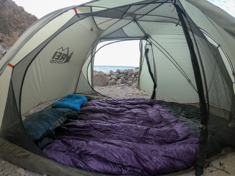 View inside of camping tent set up on the beach