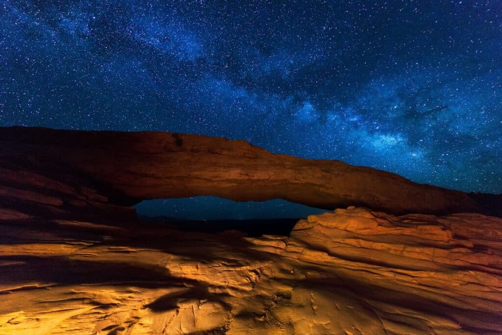 Starry night sky over Mesa Arch in Canyonlands National Park, Utah