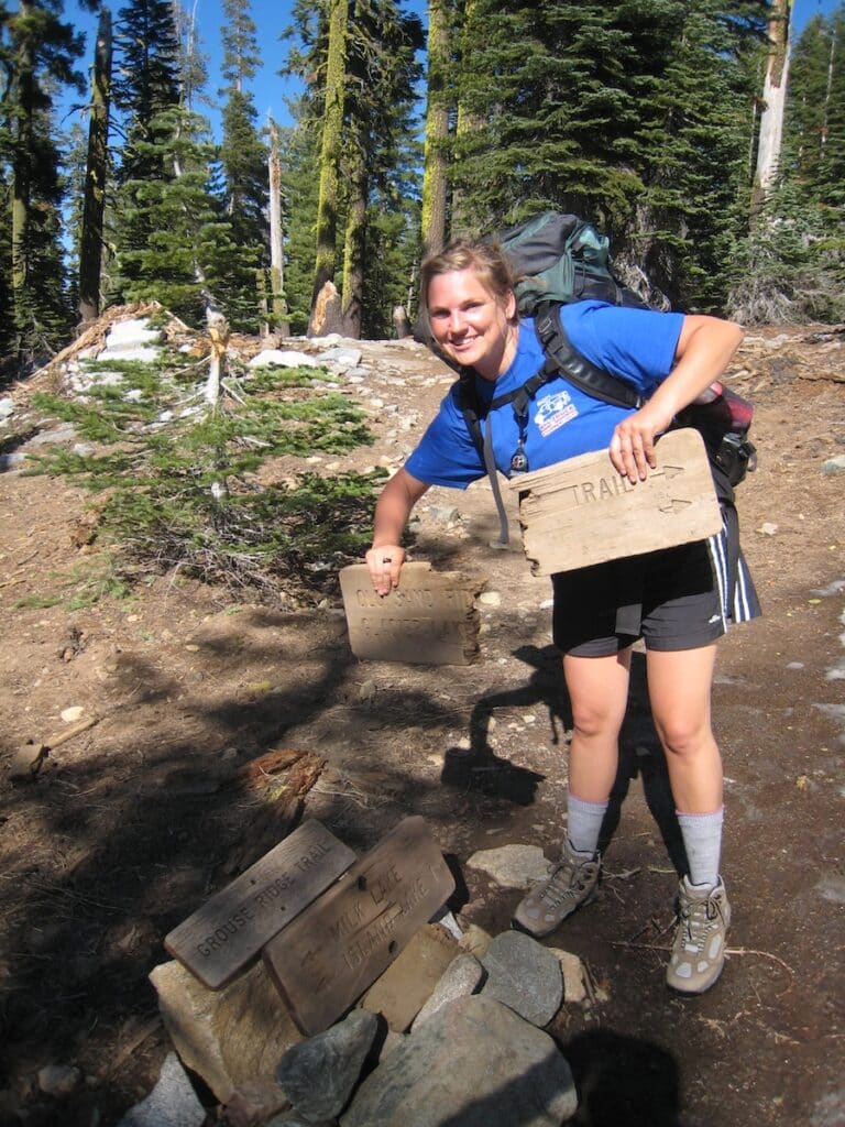 Backpacking in Emigrant Wilderness California with a broken trail sign