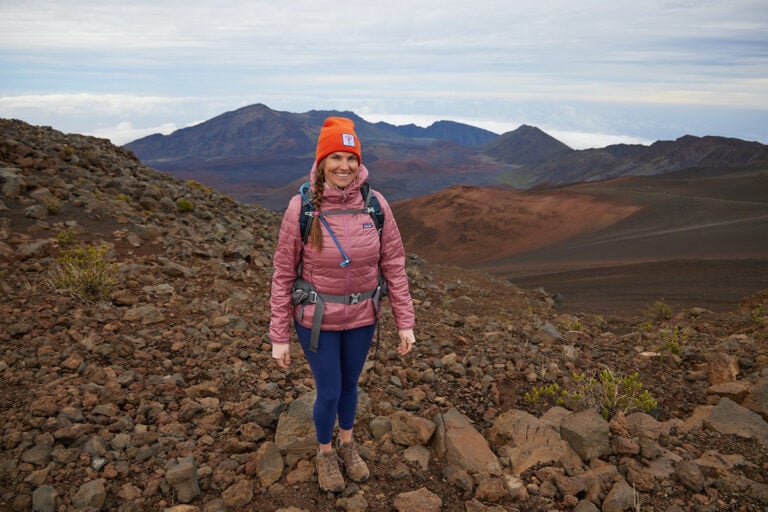 BFT Founder Kristen wearing a pink Patagonia Nano Puff Hoodie in Maui at Haleakala National Park