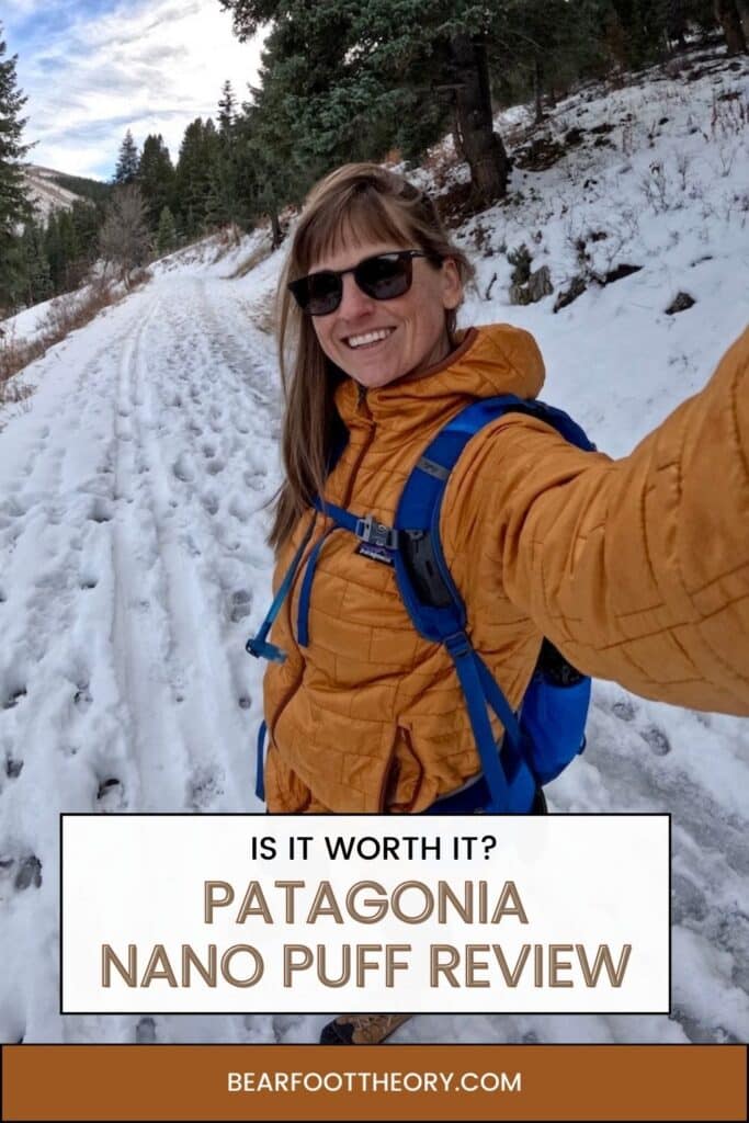 Pinnable image of woman taking selfie on winter hike. Text reads "Is it worth it? Patagonia Nano Puff Review"