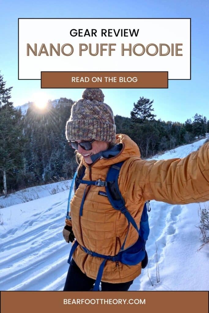 Pinnable image of woman taking selfie wearing Patagonia Nanopuff Hoodies while on a winter hike. Text reads "Gear review: Nano Puff Hoodie"