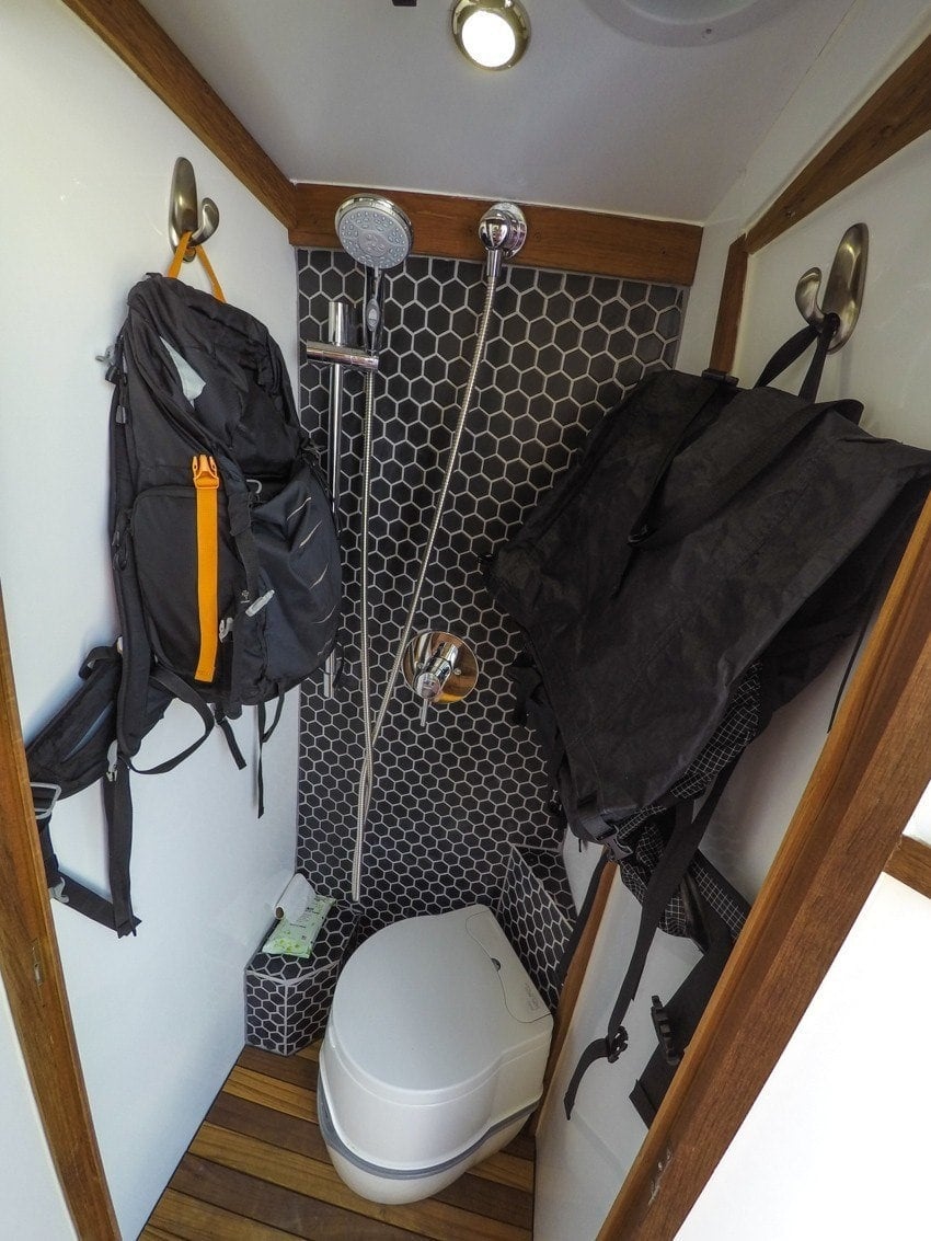 Full bathroom with shower and toilet in a Sprinter Van conversion