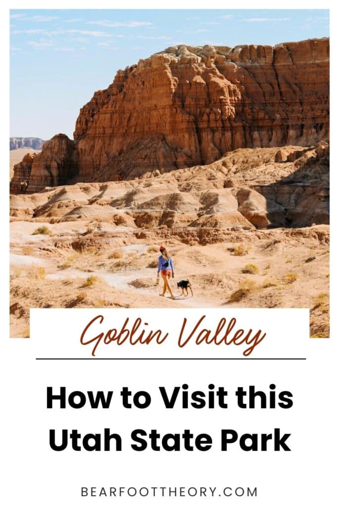 Pinterest image with text about reading this travel guide to Goblin Valley with an orange rock formation in the background
