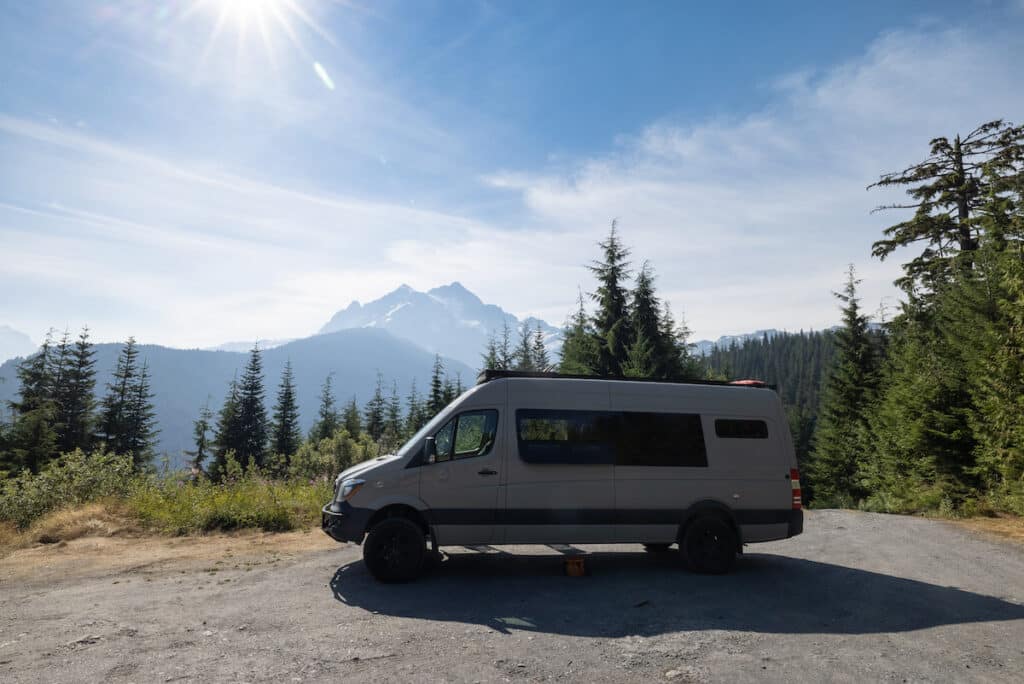 Sprinter Van camped at a dispersed campsite with Mount Baker in the background