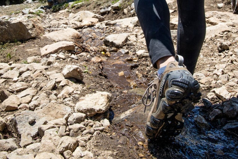 Should your hiking boots be waterproof? Learn the difference between waterproof vs non-waterproof hiking boots and which ones you need.